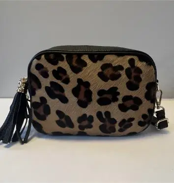 Kleine tas met een verstelbare riem